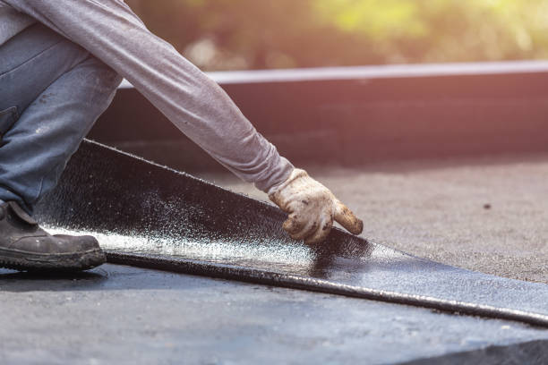Professional Basement Waterproofing technician working in Saint Bernice, IN